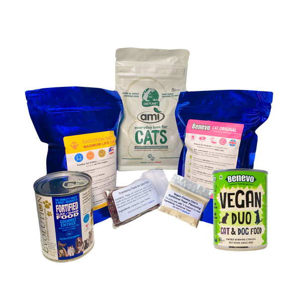 Vegan natural food all-in-one sample pack for cats in Canada featuring cans, dry food, and nutritional yeast.